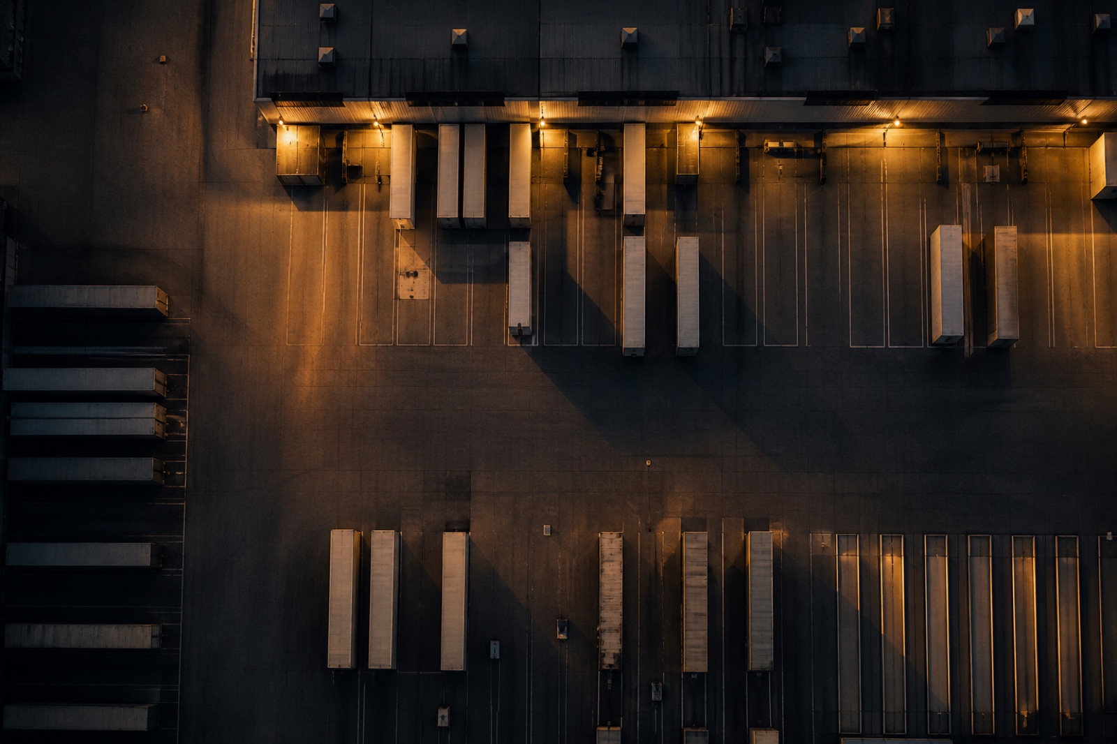 Aerial view of a logistics yard at dusk